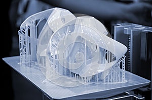 Printed models on 3D printer close-up. Objects printed on photopolymer sla 3D