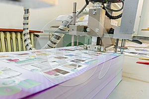 Printed sheets on folding machine into printing plant