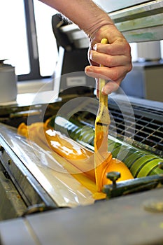 The printer applies ink inks. The printing process