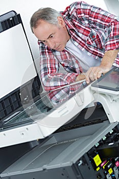 Printer checking print run at table