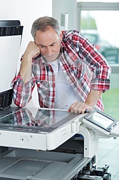 Printer checking print run at table