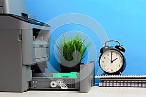 Printer, copier, scanner on color background . Office table - Image