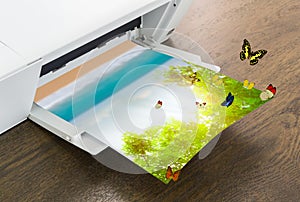 Printer with green leaf and butterfly
