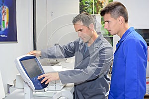 printer and apprentice fixing printer