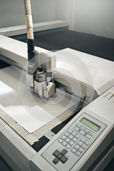 Printer, machine and paper laser at warehouse with manufacturing distribution, ink jet or press. Technology, automated