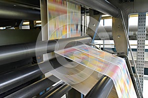 Printing of coloured newspapers with an offset printing machine at a printing press company