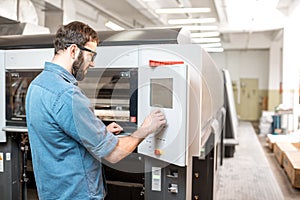 Printing operator working at the manufacturing