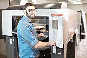 Printing operator working at the manufacturing