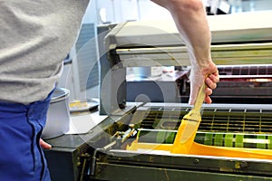 Printing. Printing machine. The printer applies ink inks. The printing process