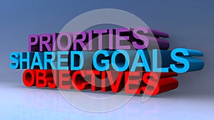 Priorities shared goals objectives on blue