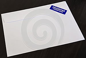 Priority air mail envelope on dark background