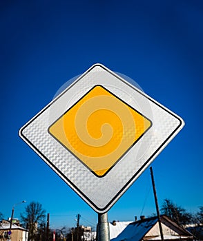 Priority road sign, sign main road on blue background