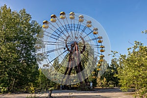 Pripyat abadoned wheel on square inside ghost town