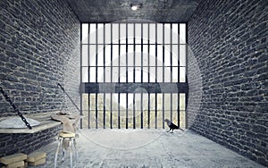 Prison cell with green mountains outside