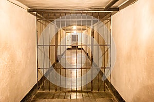 Prison cell with iron bars
