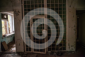 Prison cell room in the abandoned police station building located in the Chernobyl ghost town