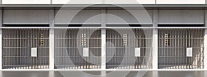 Prison cellblock, jail bar door locked, empty dungeon in a row, front view. Jailhouse. 3d render photo