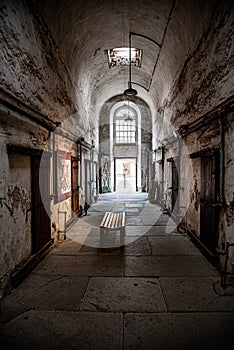 Prison corridor with cells on both sides