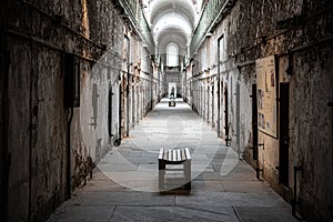 Prison corridor with cells on both sides