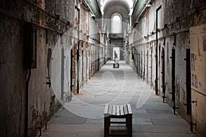 Prison corridor with cells on both sides