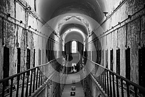 Prison corridor with cells on both sides