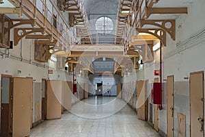 Prison corridor with prison cells photo