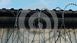 Prison fence, barbed wire, electric fence in a prison in slow motion. Border fence