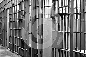 Prison jail cell locked bars photo