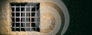 Prison, jail window with rusty bars on old wall background. Banner, copy space. 3d illustration