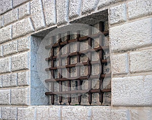 Prison of the Palazzo Ducale in Venice. Iron bars on the window of the old prison. Rusty prison bars