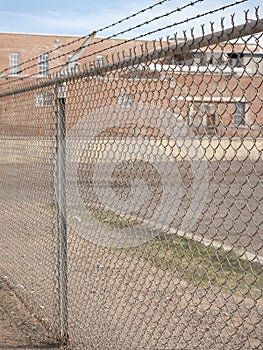 Prison wall and prison building photo