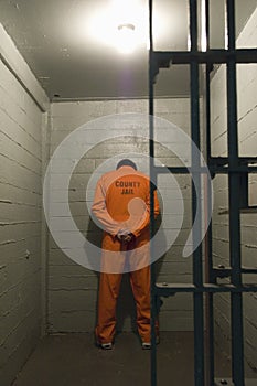 Prisoner In Prison Cell