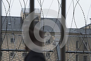 Prisoner at the window of a prison cell