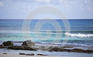 Pristine beach with rocks on the Caribbean Sea in Cozumel, Mexico, panoramic shot