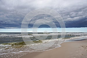 Pristine empty sand beaches with forest and sand dunes on the shore