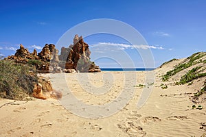 pristine untouched rugged coastline sand dunes