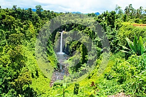 Pristine waterfalls in the middle of tropical jungle of Upolu, Upolu Island, Sopoaga Falls in Samoa, Polynesia central Pacific photo