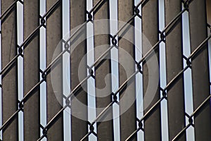 Privacy chainlink fence with a blue sky background