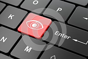 Privacy concept: Eye on computer keyboard background