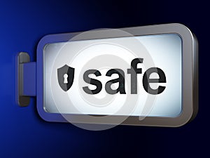 Privacy concept: Safe and Shield With Keyhole on billboard background
