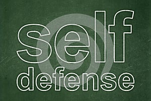 Privacy concept: Self Defense on chalkboard background