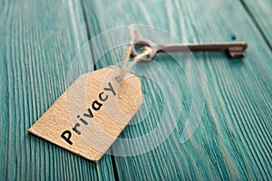 privacy concept - vintage key with tag with inscription