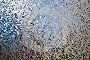 Privacy glass with intricate texture.