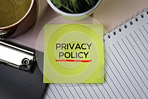 Privacy Policy text on sticky notes with office desk concept photo