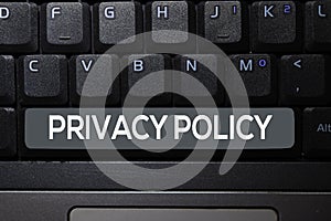 Privacy Policy write on keyboard isolated on laptop background