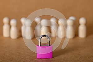 Privacy and Security Concept: Pink Padlock in Focus with Blurred Crowd in Background