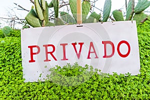 Privado sign what translated from Spanish and Portuguese means Private photo