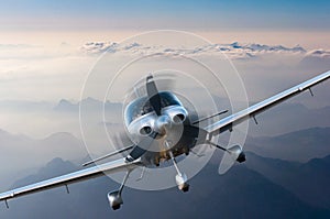 Privat light airplane or aircraft fly on mountain background. VIP travel concept