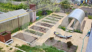 Private agriculture with beds and greenhouses