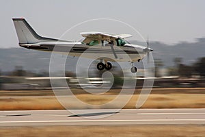 Private airplane landing - panning